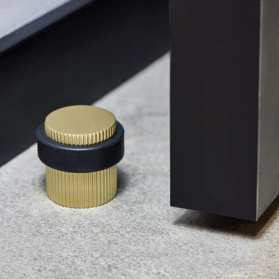 Fußzeile Helix Stripe Goldener Bodentürstopper