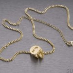 TB_Necklace_Gold_Detail_logo_1_web-scaled.jpg